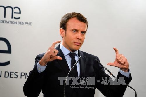 French presidential candidate pledges to protect middle class - ảnh 1